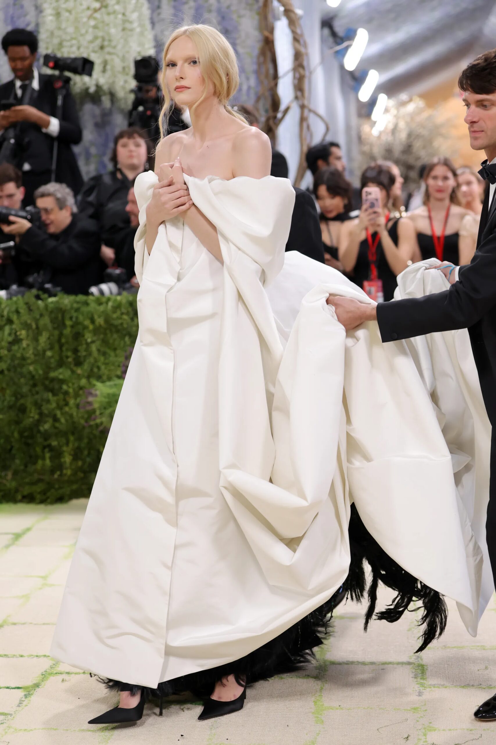 Alex Consani Steps Out in Sheer Gucci Gown With Feathers