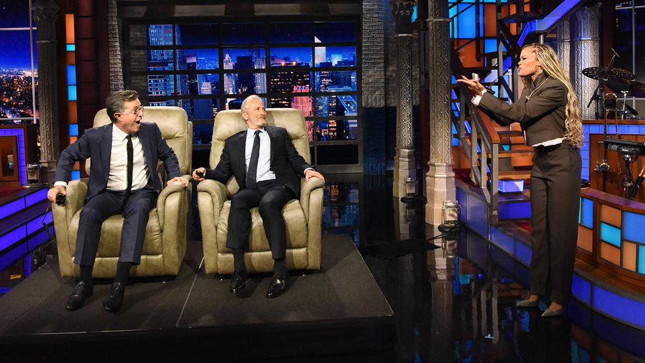 Jon Stewart Surprises Stephen Colbert With Recliner, Andra Day